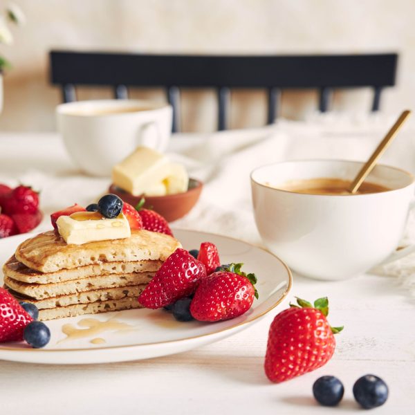 selective focus shot of sliced vegan pancakes with fruits